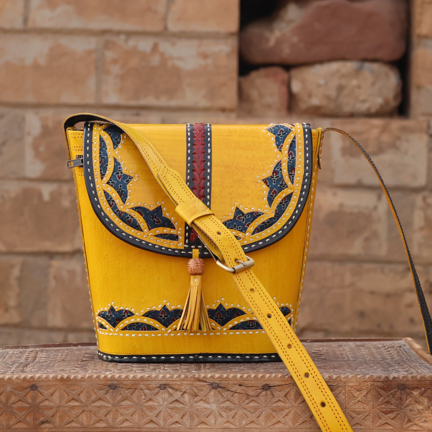Marigold Motif Sling | 100% Genuine Leather | Handwoven Stitch Design